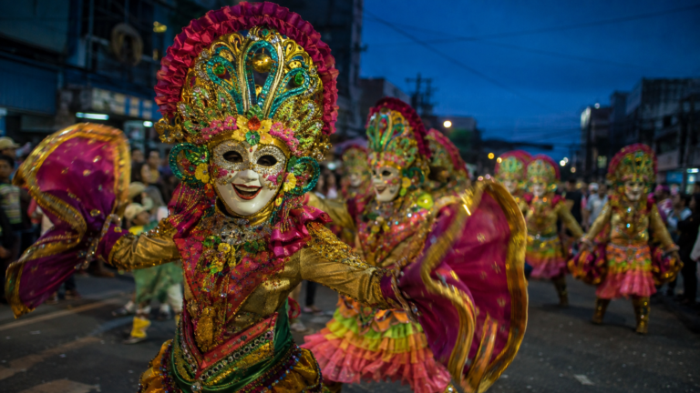 MassKara Festival dancer in a hand-crafted mask in Bacolod