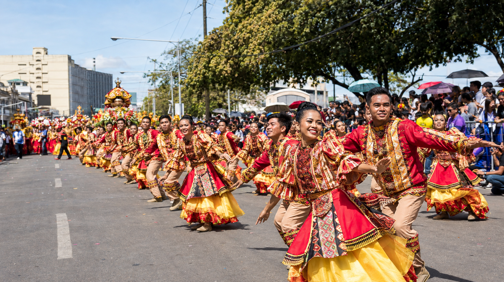 Sinulog dancers performing in a Cebu City street parade